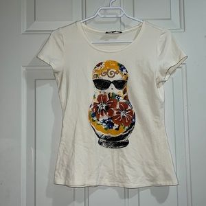 Cream-coloured t-shirt with matryoshka print
